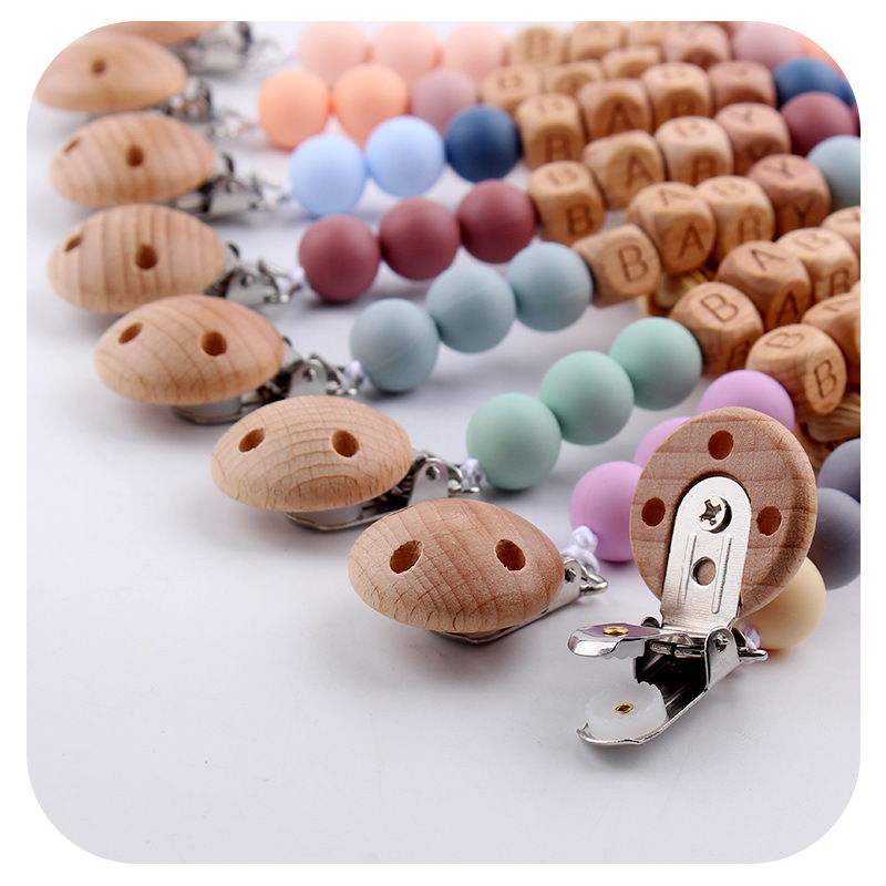 New Baby Pacifier Clips Person - đánh giá và giá Baby Food Teether